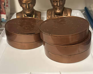 Lot 109: Abraham Lincoln busts and penny bank (plastic)