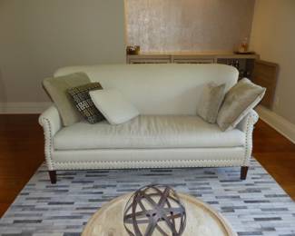 Neutral sofa, Pair of Club Chairs (As Is), Round Coffee table, Area Rug,