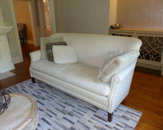 Neutral sofa, Pair of Club Chairs (As Is), Round Coffee table, Area Rug,