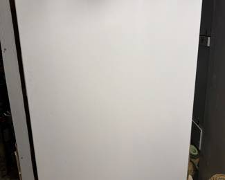 White upright freezer