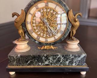 Antique Mantle Clock with Patinated Bronze Birds Mounted on Marble Base.  Measures 6.5" x 2.5" x 6" H. 