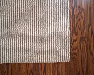 Light Wool Area Rug. There is Fading Underneath The Ottoman. Measures 14' 8" x 16". Photo 3 of 4.