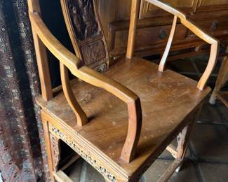 Pair of hand carved wooden Asian chairs