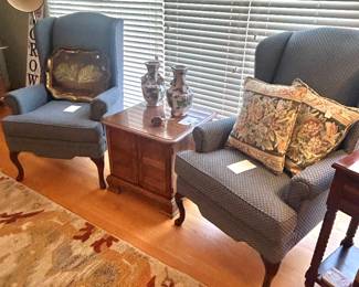 set of blue wingback chairs