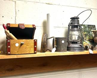 wooden box with small rolling pins, lantern 