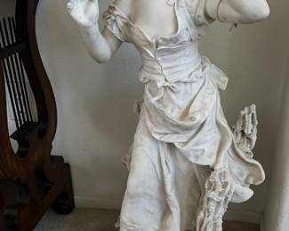 I am fairly certain this is an alabaster statuette.