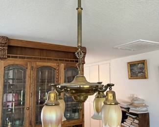 You'll want to take a look at this chandelier as it is a Muller Freres design.