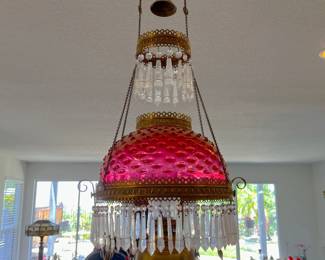 This lamp seems to match the more cylindrical lamp seen in the previous picture.