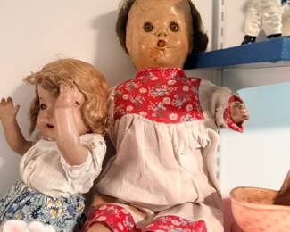 Antique composition dolls in vintage dresses