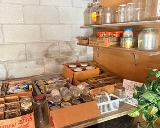 Shelving unit with jars and canning supplies