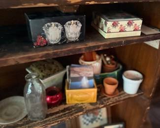 Wooden shelf with trinket boxes and knick-knacks