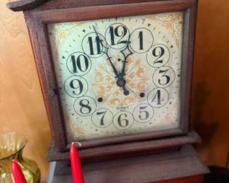 Antique wood mantel clock arched top