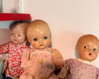 Trio of antique composition dolls