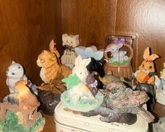 Rabbit and cat figurine collectibles with tin box