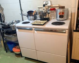 Vintage stove with stacked cookware