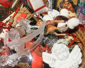 Basket of angel figurines and holiday ornaments