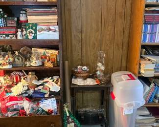 Cabinet shelves with books, figurines and decor