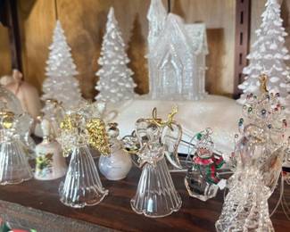 Glass frosted Christmas trees and church figurines