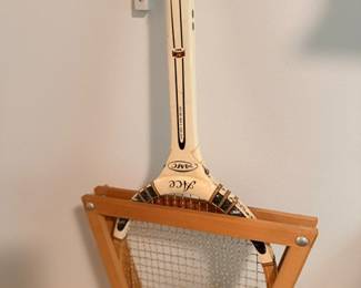 Vintage wooden tennis racket with press