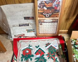 Wooden wall calendar and decorative doormat