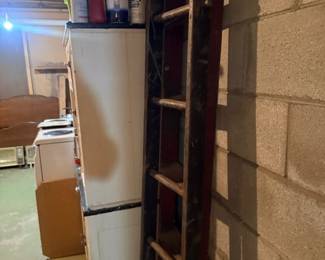 Wooden ladder and basement storage items