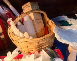 Woven basket with candles and silk flower decor