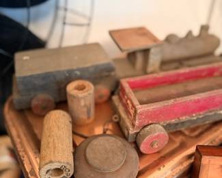 Antique wooden toys — pull train, spinning tops & mallet