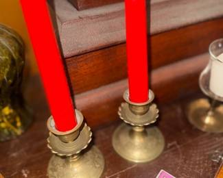 Brass candlestick holders with taper candles