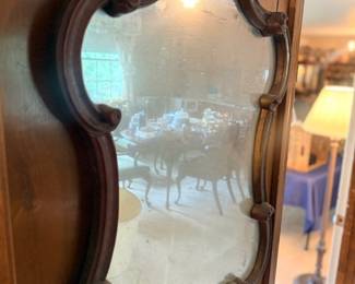 Antique ornate carved wood wall mirror