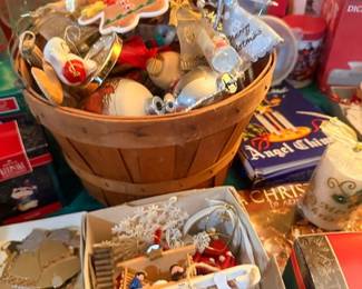 Basket of Christmas ornaments and angel decor