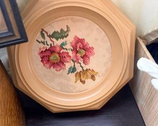 Framed floral needlepoint in octagon frame