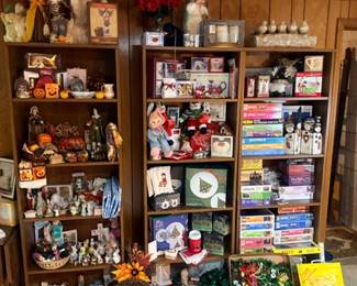 Shelf of holiday decor and DVD collection