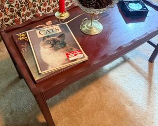Wood coffee table with candlesticks