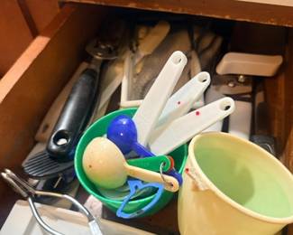Vintage measuring cups and kitchen gadgets lot