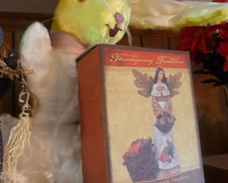 Plush yellow rabbit toy and Thanksgiving decor