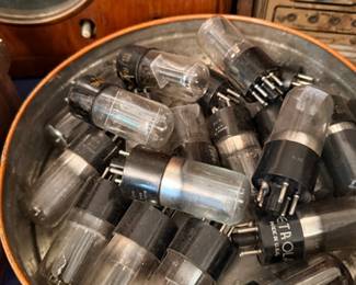 Copper bowl of vintage radio vacuum tubes