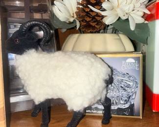 Decorative sheep figurine with faux florals