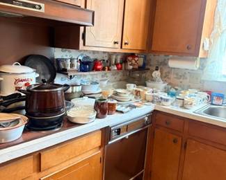 Kitchen counter with cookware & dishes