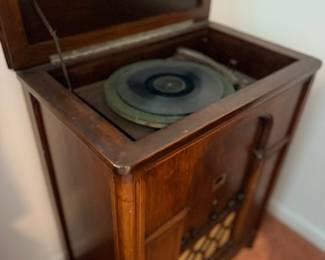 Antique wooden phonograph record player cabinet