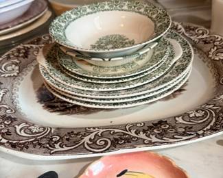 Green transferware plates and painted fruit dish