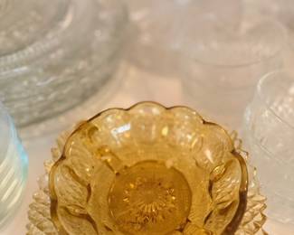 Amber pressed glass bowl with lace pattern