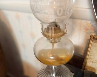 Antique glass kerosene oil lamp with etched chimney