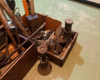 Small anvil, vise and vintage tool crate