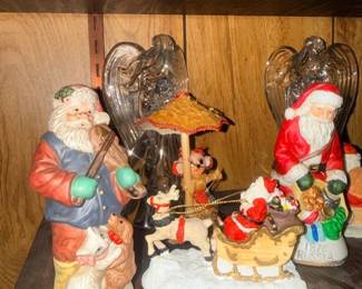 Ceramic Santa figurines and manger scene decor