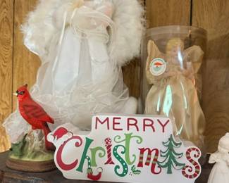 Angel figurine and Merry Christmas sign decor