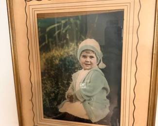 Antique hand-tinted child portrait in gilt frame
