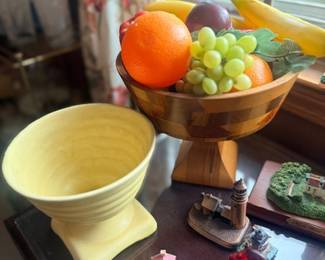 Yellow Fiestaware bowl and wood fruit bowl decor