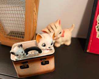 Vintage ceramic kitten figurines in basket