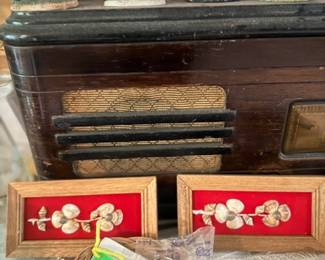 Vintage tabletop radio and lighthouse decor