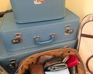 Vintage blue luggage set with train case